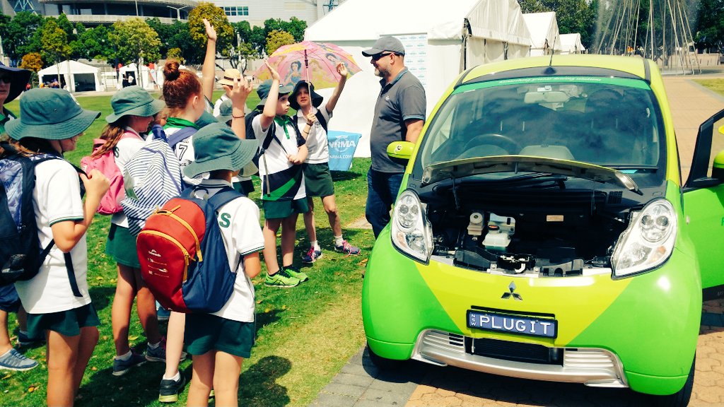 #YES2017P students getting revved up with <a href="/NRMA/">The NRMA</a> awesome electric car #PlugIt ! @olympicpark_syd