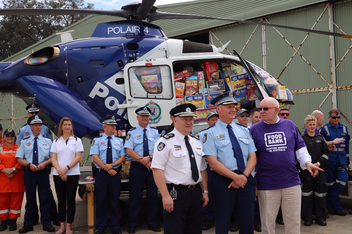 ShaneFitzAU's tweet photo. NSW Police Force 'Stuff Your Chopper' Challenge to NSW Emergency Service Agencies - Challenge Accepted by NSW RFS. Last year NSW RFS members won the challenge by collecting just under 13 tonnes for Foodbank NSW/ACT. Let's do it again team! #stuffyourchopper https://t.co/lh7VHE0t7e