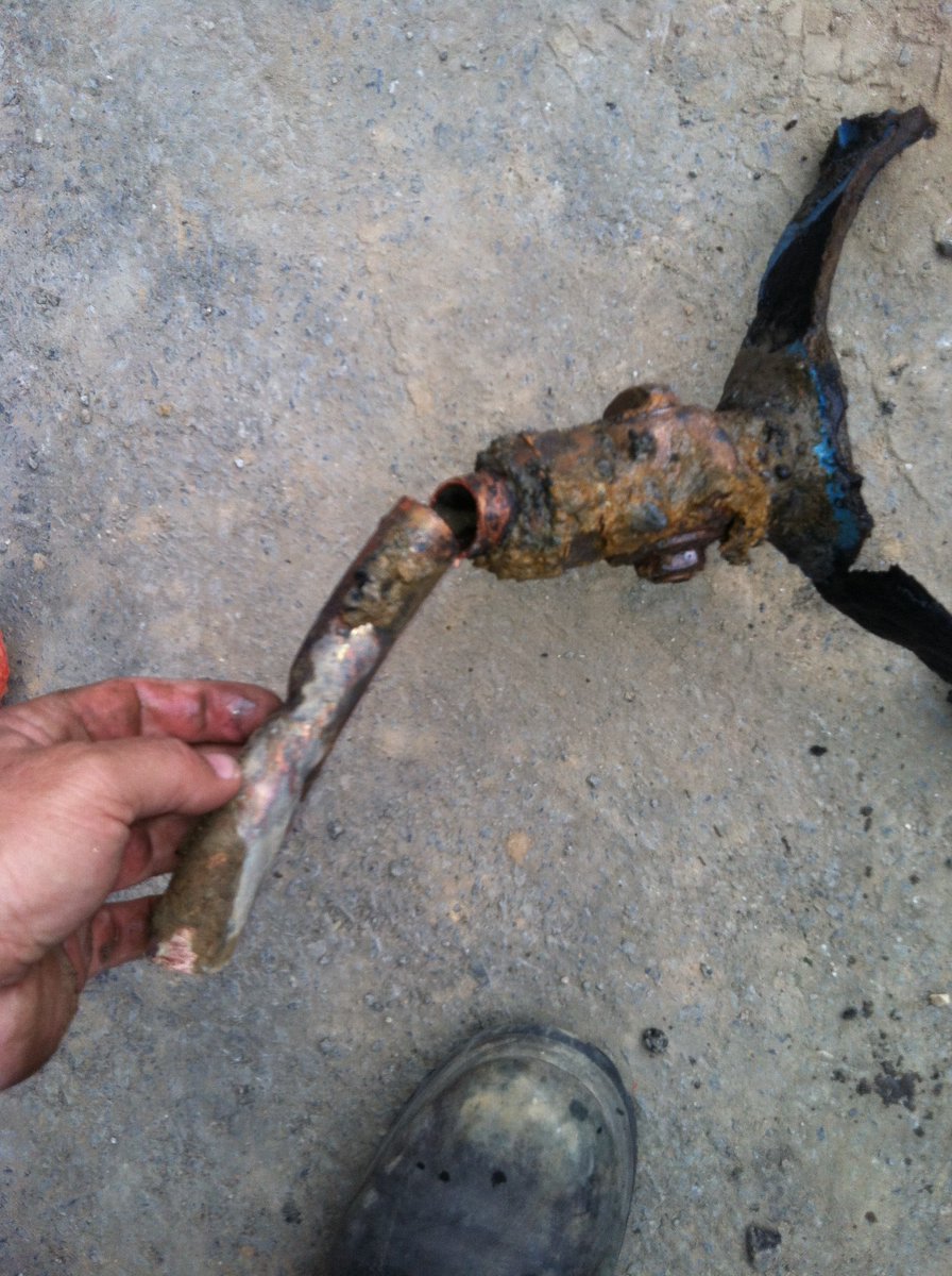 AMConstruction4's tweet image. Deteriorated saddle caused a leak off city main. Main closed and new saddle and pipe connected.