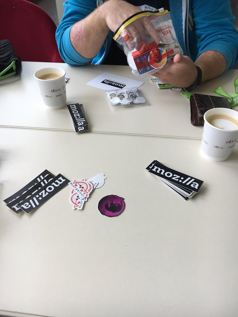 A bunch of stickers on the table.