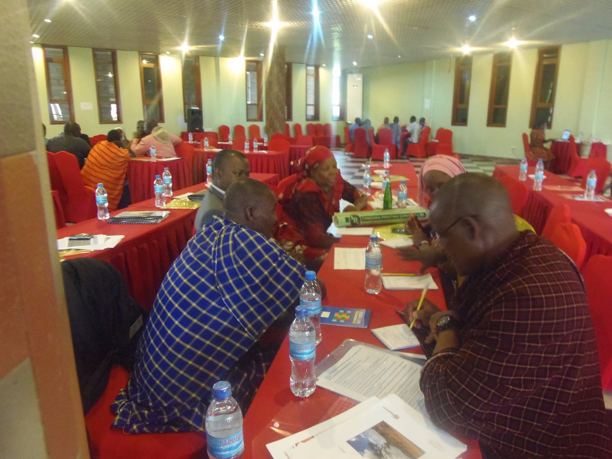 HakiMadini2012's tweet photo. Small groups of participants discussing overall findings and recommendations of Women's Land Tenure Security(WOLTS) action research at Multi-stakeholder Workshop on Gender, Mining and Pastoralism in Tanzania #landrightsnow @MokoroLtd #WOLTS #Tanzania https://t.co/HoWAz32BrT