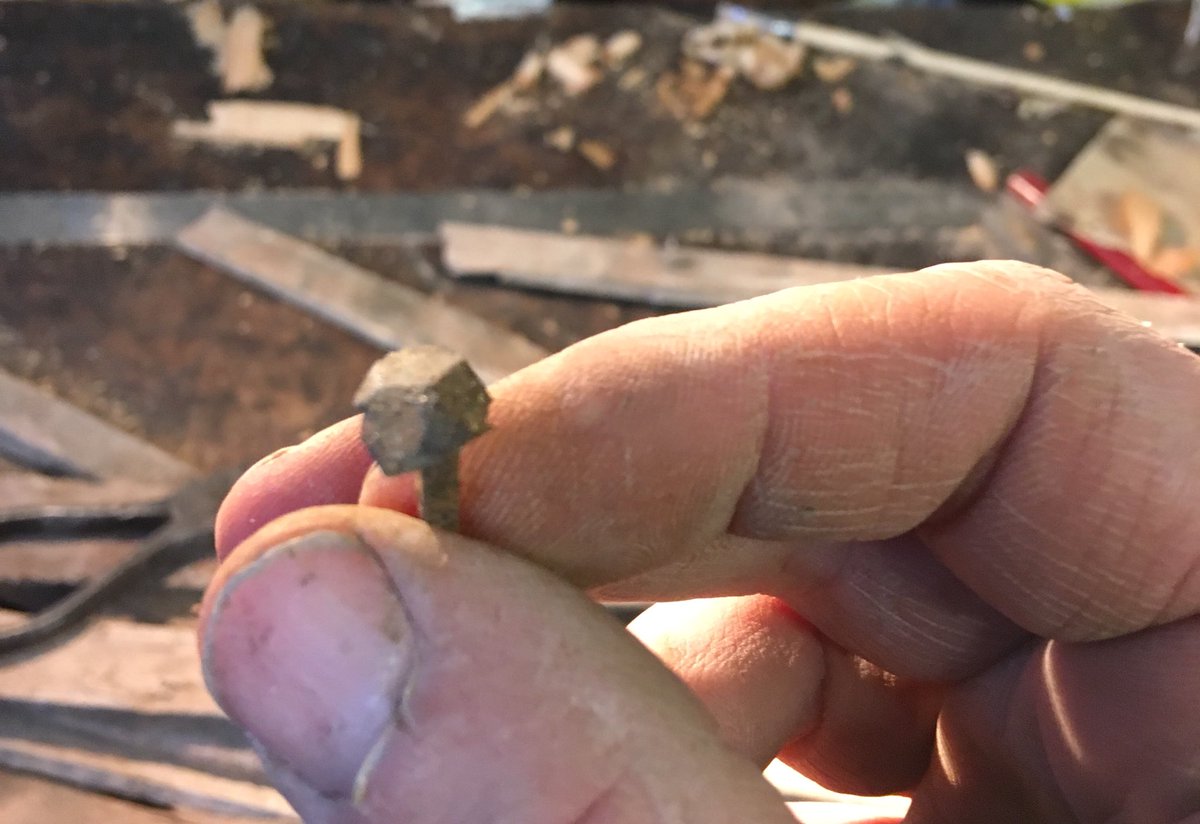Salvaging ‘rosehead’ nails from 18thC laths I found in a skip, the faceted heads were created by four blows from the nailmaker’s hammer.