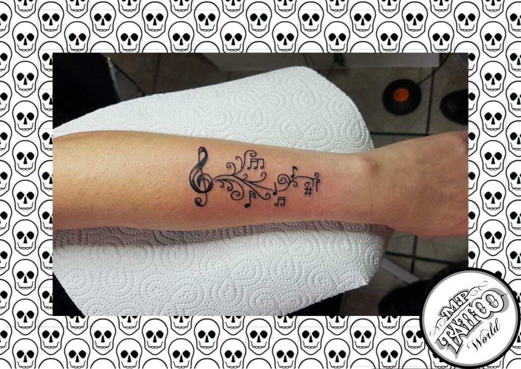 world_mp's tweet photo. #mptattooworld #tattoo #krefeld #ruhrgebiet #germany #woman #arm #black #noten #notenschlüssel #ranken #Musik https://t.co/6l1O3xMd39
