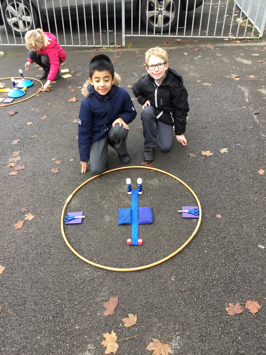 CastlehillPri's tweet photo. #Primary3 exploring the school for symmetry and then testing each other by making symmetrical patterns! #chilly #outdoormaths #symmetryfun https://t.co/hId3q11kTo