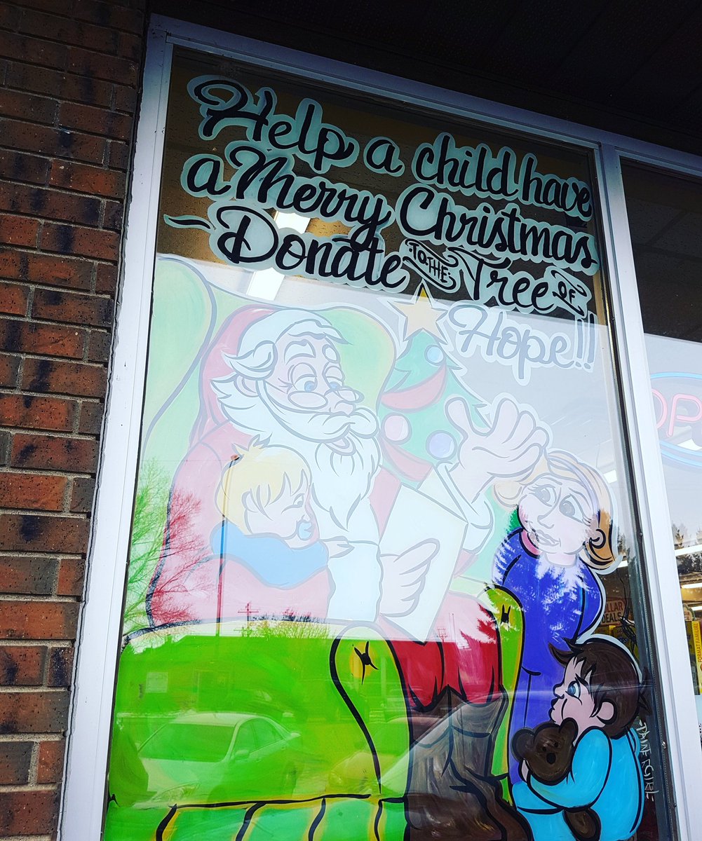 Pharmasave window in redcliff is done for their tree of hope campaign