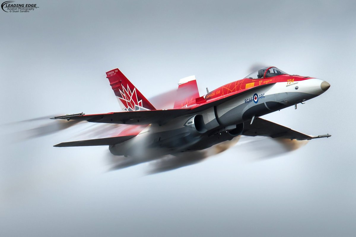 CF18Demo's tweet photo. #ThrowbackThursday to an incredible shot of the #Canada150 jet taken by Stuart Sanders during spring training in Comox. This shot took First Place in the Military category of the annual @SkiesMag aviation photography contest. Congrats Stuart! 

#CF18Demo #avgeek #RCAF https://t.co/c7xM5XA90d