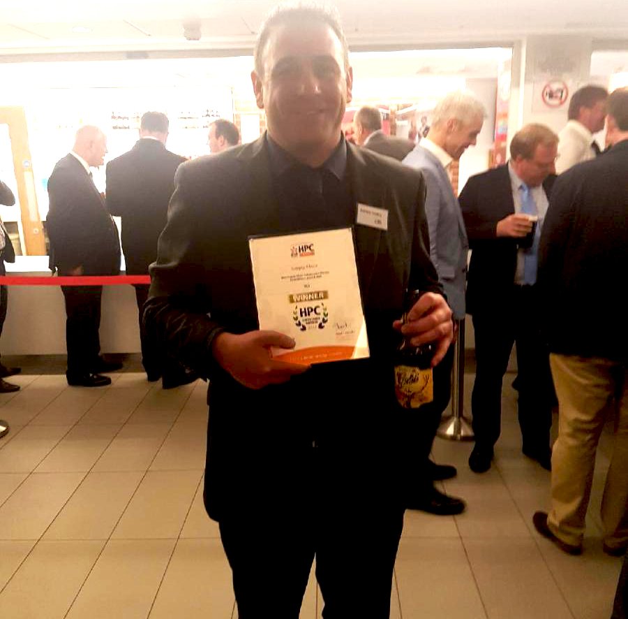 TCiGB's tweet photo. @adriansealey proudly holding his gold #hpcexcellenceawards #GoldRibbon @exmoorales #ExmoorGold https://t.co/oLRcZr315f
