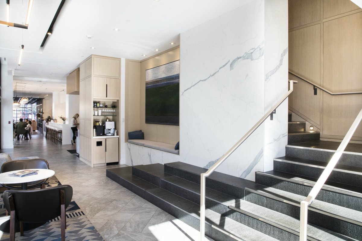 vestamarble's tweet photo. We're proud to have contributed to the elegance of the @AndazOttawa! 
Starting in the lobby, you can see our ground floor showpieces; the check-in stands made of Carrara #marble, the wall wrapped in #MAXFINE Statuario &amp; the stairs clad in #limestone. #hirelocal #Ottawaproud https://t.co/AjFXEew5Cf