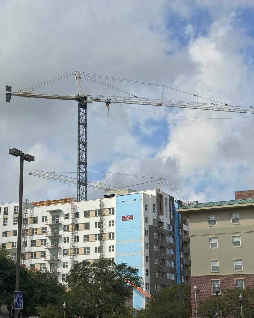 MattRisinger's tweet photo. Saw this at Texas A&M today. Looks like a new dorm is using some @poly_wall #BlueBarrier Fluid Applied Weather Barrier on this Building. I want to build a project with a tower crane someday! https://t.co/2r6g1GxDoj https://t.co/I3okfWNaOT