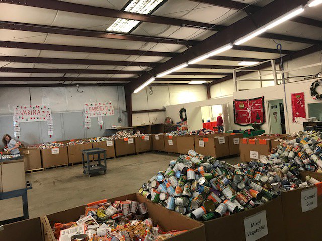 HighwoodsProp's tweet photo. Highwoods Helps Richmond helps sort through canned goods for @HenricoCM , an organization providing food, new clothes, toys and other gifts to families who need it most over the holidays. #dogood #giveback https://t.co/r8lHqutCq1