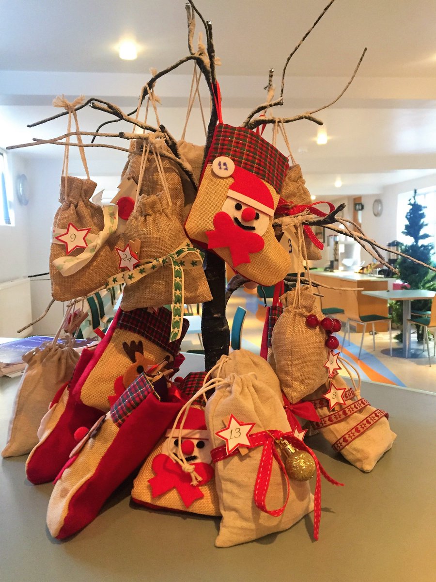 We are all getting into the Christmas Spirit here with our Advent Calendar made by Ilina