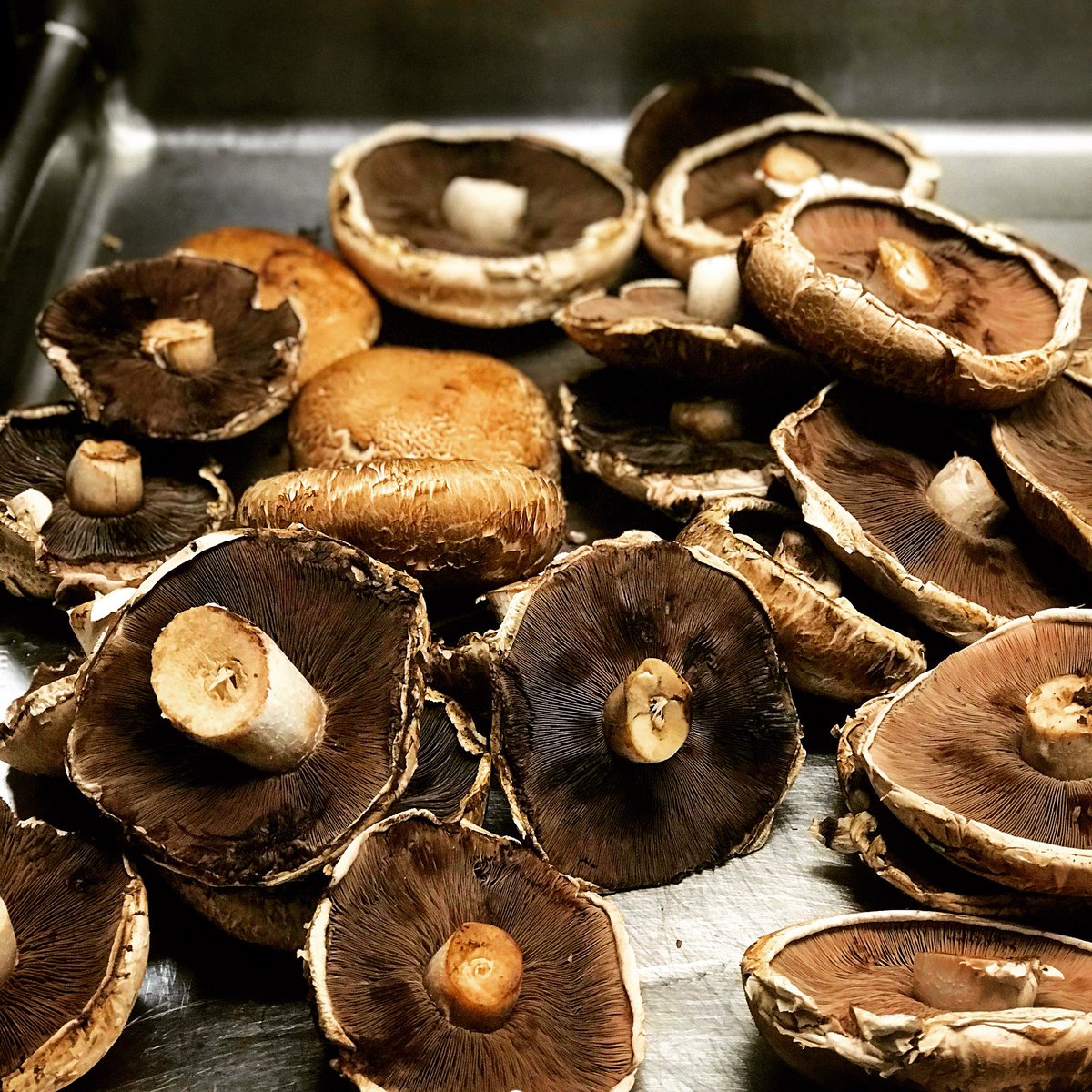 Being a “scratch kitchen” restaurant means putting in the hard work that goes along with it. This is how our portobello mushrooms start before they are sliced up, marinated and cooked to the perfect tenderness for your enjoyment!🍄