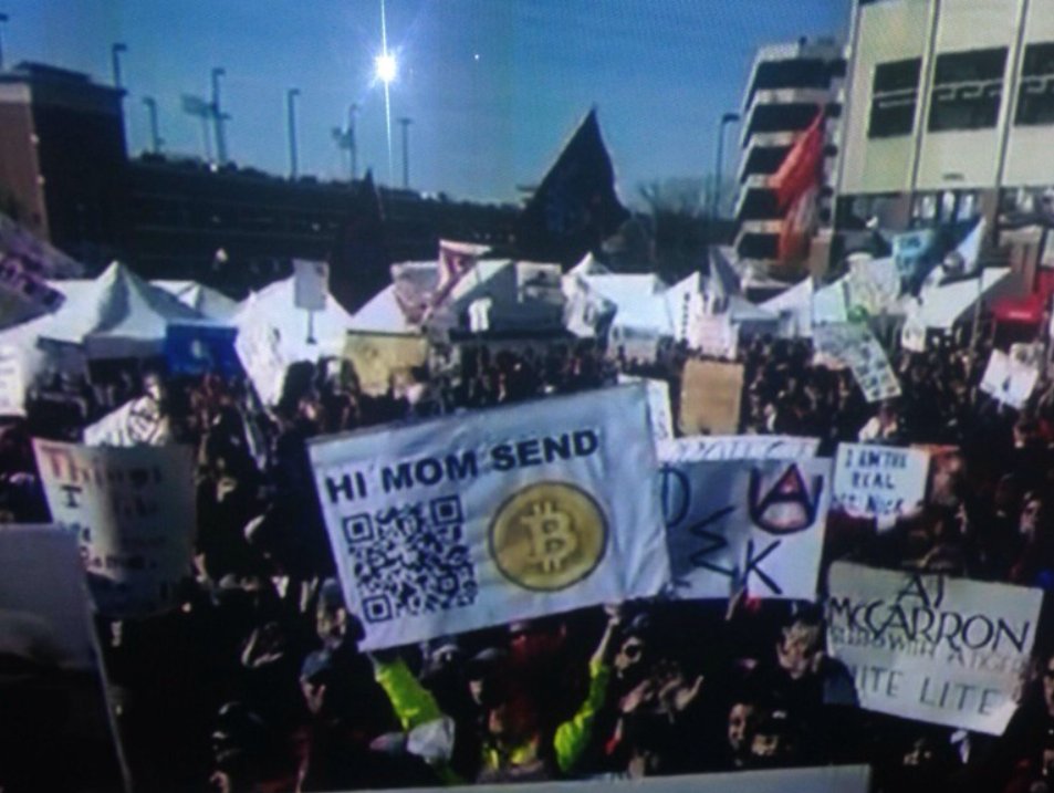 Four years ago, a random guy had this sign up during a live ESPN TV show. People sent 23 Bitcoins to the address in the QR code, for fun. That's $230,000 today.