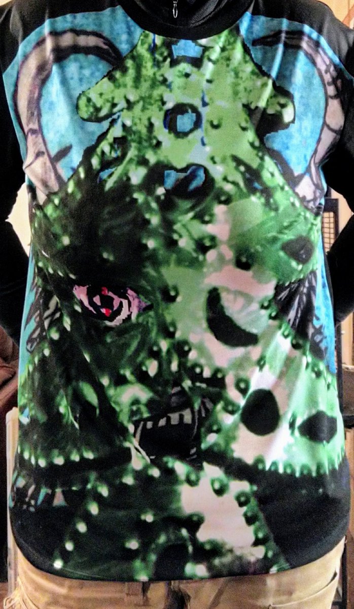 AshNFinn's tweet photo. Hell yeah, love how the design came out on the graphic tee! I get to wear my own unique design this festive season. #Christmas #Krampus #redbubble https://t.co/hwKdru2QQD