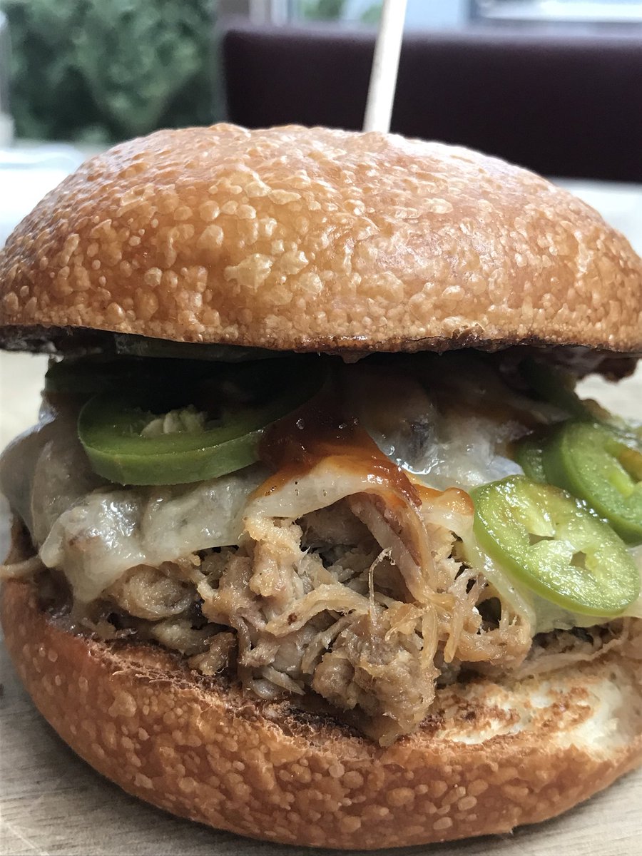 TheBauerKitchen's tweet photo. Our #dailysandwich is house made pulled pork on a brioche bun with apple butter BBQ sauce, aged white cheddar and pickled jalapeños #KWAwesome #delish #tbk https://t.co/8Yx1vcRjxU