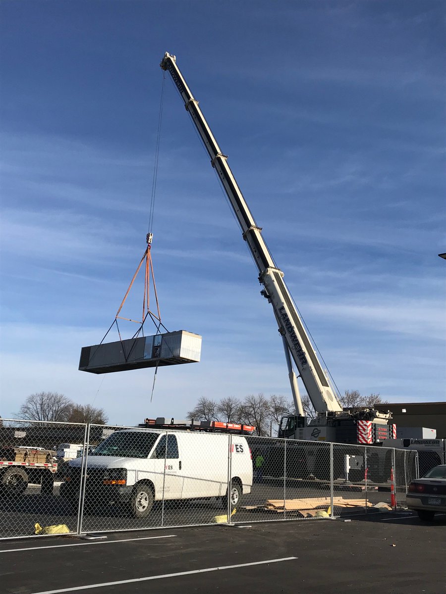 WillmarElectric's tweet photo. One of two roof top units being lifted into place at the Willmar Surgery Center. Our flex assemblies have been installed and are hanging out of the bottom. #WillmarWorks https://t.co/Fg9mYLYbSq
