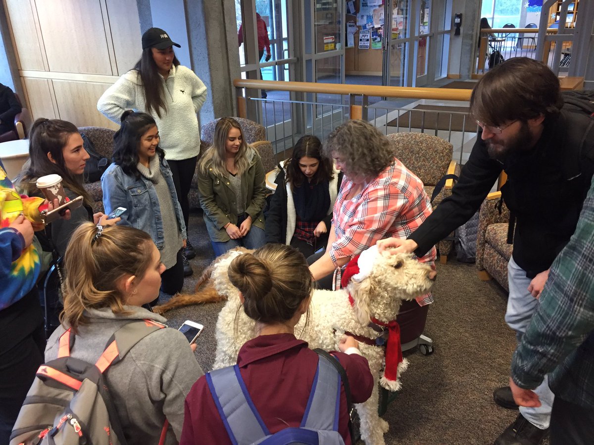 EWUEagleStore's tweet photo. The pups are here &amp; so are we! Giving our snuggles &amp; cash respectively! #PawsAndRelax #TextbookBuyback https://t.co/phzKYSteSR
