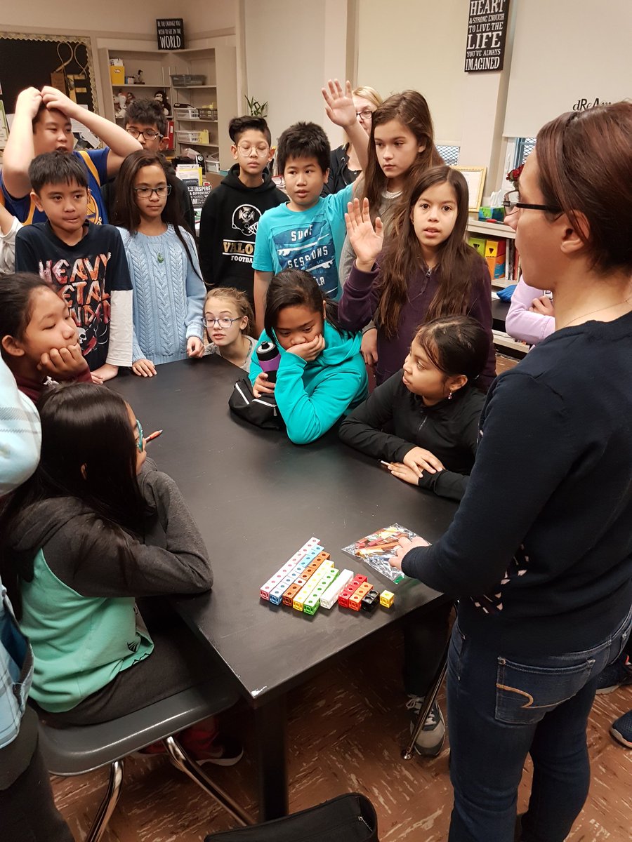 SargentParkSchl's tweet image. Down the hallway.....grade 6 students understanding fractions using manipulatives and chocolate bars....mmmm #fractionsarecool @WinnipegSD