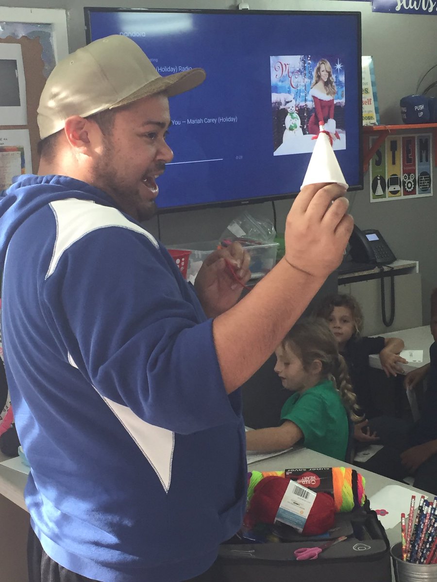 R9Liza's tweet photo. Joshua at Thrive #afterschool program demonstrating how to create a holiday tree ornament #R9asp https://t.co/HE15qwCBTW