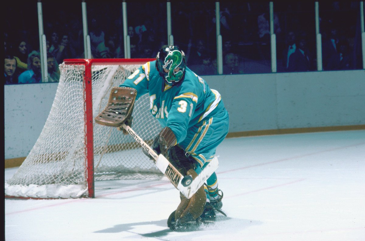 NHLFoster's tweet photo. The unis worn by the 1974-76 California Golden Seals epitomized the Disco Era... Teal, yellow &amp; a goalie mask that featured a Green Cobra.  https://t.co/se9R9is8yO #NHLGreatestUniforms https://t.co/szJ4hUTreV