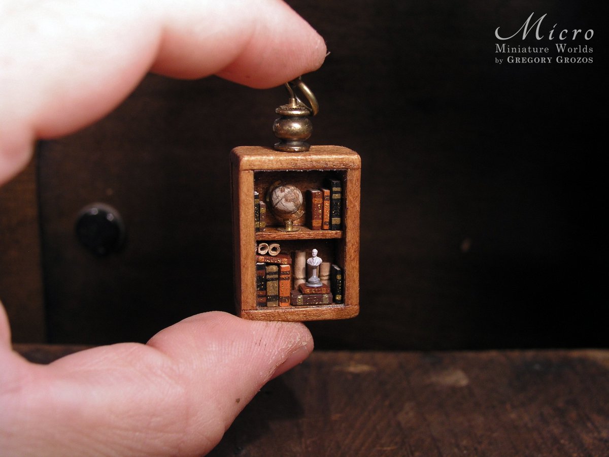 GregoryGrozos's tweet photo. Latest creation by @GregoryGrozos Miniature library pendant to carry on oneself! Available at my Etsy: https://t.co/GFkhFUY4ho https://t.co/fWmwr26d2u