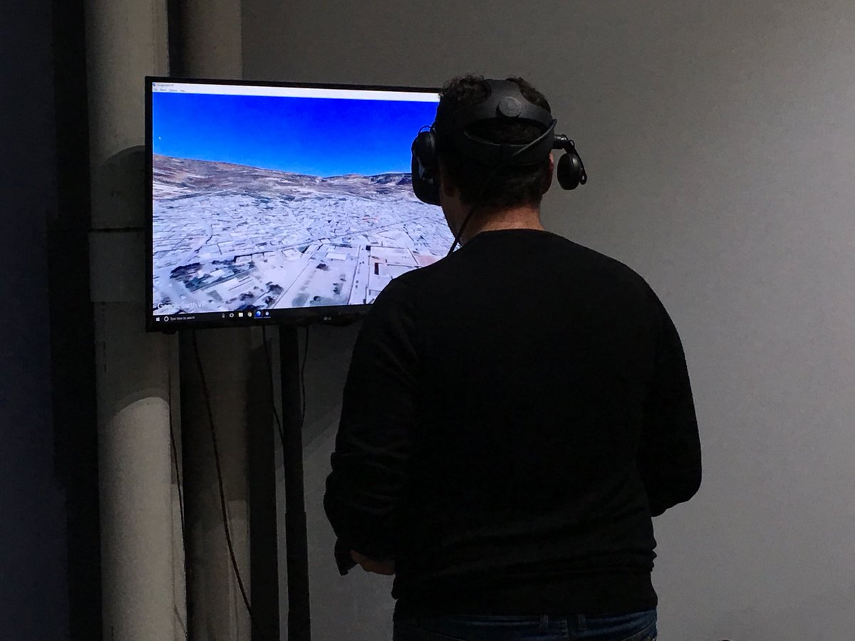 Saddam Sayyaleh using virtual reality at @NewTerritoryVR  to take us to the orphanage he grew up in in a Jordanian refugee camp. <a href="/globaltiesakron/">Global Ties Akron</a>