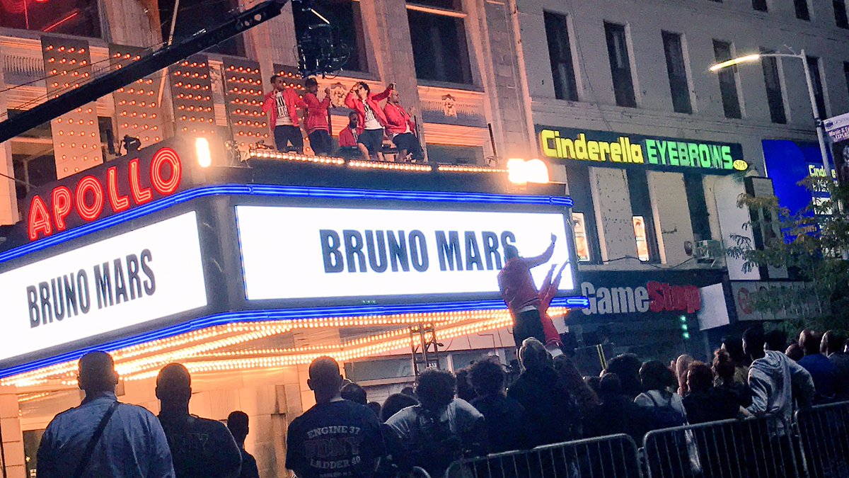 FACTS: <a href="/BrunoMars/">Bruno Mars</a> is the first artist EVER to perform on top of our legendary marquee! #BrunoMars #BrunoMarsTVSpecial #LiveAtTheApollo