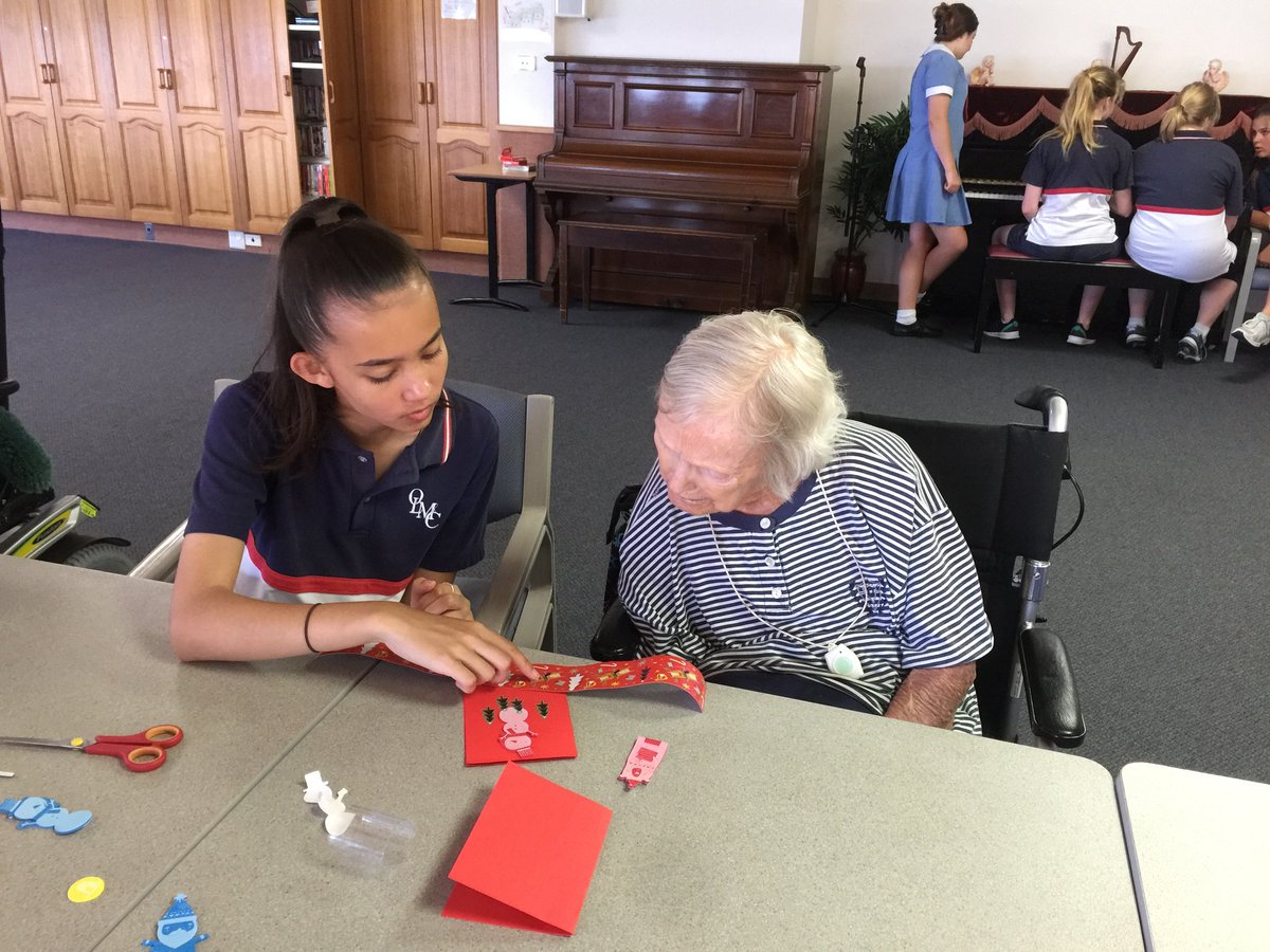 OLMCBurraneer's tweet photo. MAG students at Stella Maris Aged Care, Cronulla making cards, singing Christmas carols and sharing lunch in the fresh air and sunshine #mercyinaction #mercygirls #mercyactiongroup #service #hospitality #dignity #compassion #valuesatwork https://t.co/KxriU733Ze