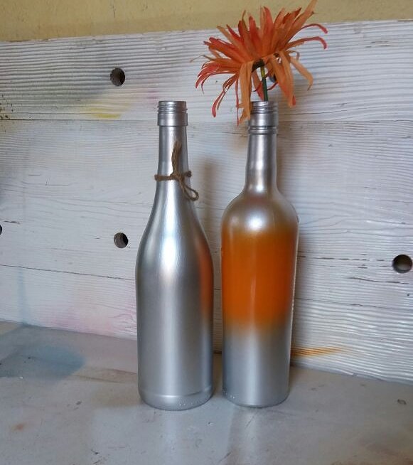 Designs_LnB's tweet photo. Flower vase to decorate your home and space. Give it a whole new vibrant colourful feel.

#vase
#craft
#design
#RSA
#winebottle
#glass
#African
#paint
#wine
#winelover
#winedrinker 
#winemaker
#orange
#silver https://t.co/avk0fw1OSm