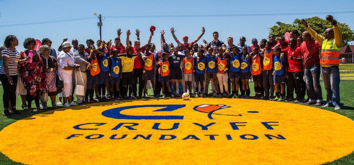 JCFoundation's tweet photo. Yesterday, in Guguletu, Cape Town, our ambassador @RonaldKoeman opened a brand new Cruyff Court with the players of @ajaxcapetown. This is how we help active children in South Africa move up! #CruyffLegacy #becauseactivechildrenmoveup https://t.co/OVvCdOXRmz