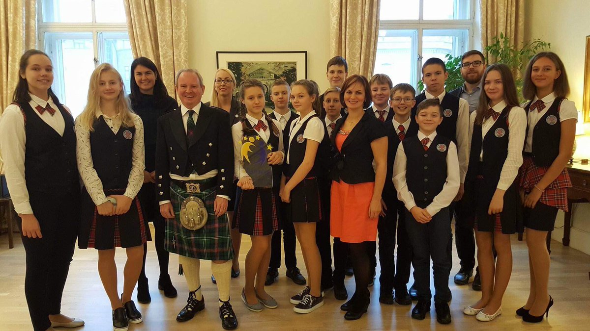 MrKeithShannon's tweet photo. Delighted to welcome staff &amp; pupils from Daugavpils Saskaņas Pamatskola to the British Embassy Riga today to hear all about their @etwinning award and to celebrate St Andrew’s Day together. Great tartan trim on the school uniforms ! #GlobalStAndrews @UKGovScotland https://t.co/wLebKjArZL
