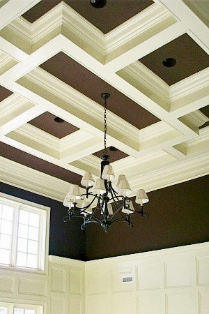 WoodmasterCC's tweet photo. Coffered ceilings are a patterned design of indentations or recesses in the overhead surface of your interior. These ceiling designs can bring drama, or add subtle detail to any room of your home. See more at https://t.co/Ka9qJHbHZ8 #ceilingpanel #ceilingdesign #designerceiling https://t.co/fia5duoVzk
