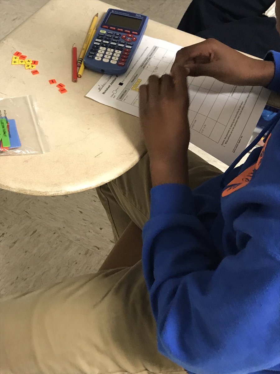 Ms.Fux using algebra tiles to help her resource students understand adding integers #conceptualunderstanding #spiralreview #svmsbobcatpride