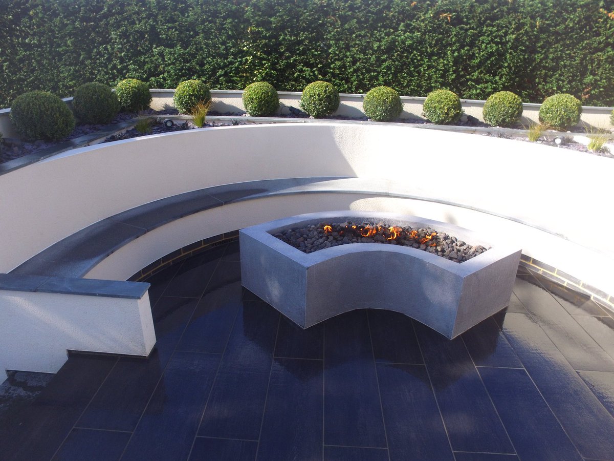 Dawsonlandscape's tweet photo. Lovely job just finished @MarshallsReg granite dark paving with Symphony verified plank paving in char colour and granite bespoke seating  #best by far #Dawson Landscapes Ltd https://t.co/W99AjGfuvH