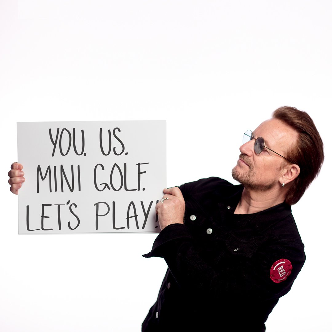 U2's tweet photo. Play mini golf with U2 and join @RED’s fight to end AIDS. https://t.co/CJ2ALzoFYt https://t.co/4wXfBgygfE