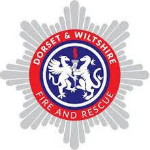 Firefighters are scaling back their operation at Hodson near Swindon where a major fire's destroyed a semi-detached house with a thatched roof.