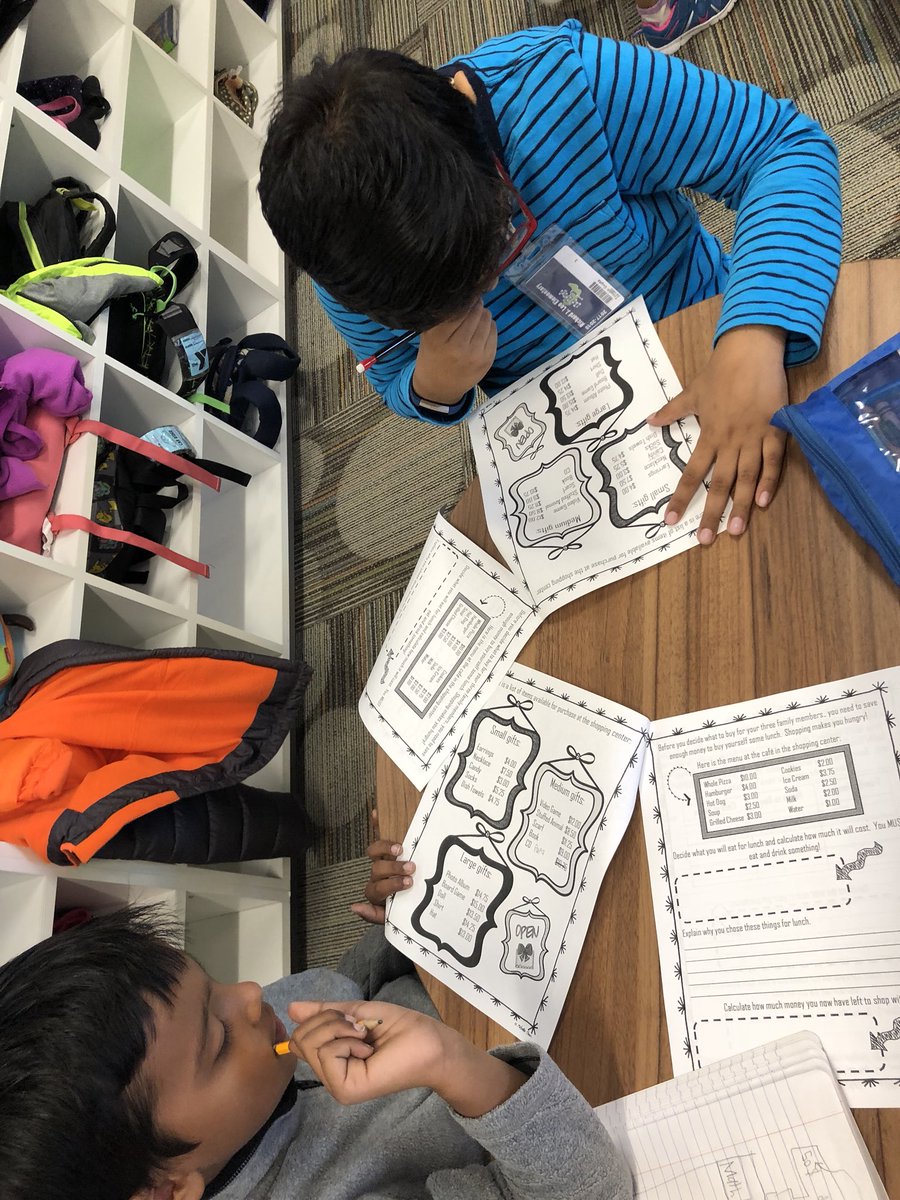 OatisNotice's tweet photo. #rjlblue2 and B3 are “shopping” for our families for the holidays! How fun to incorporate math and the holidays 😉 @kamille_mayes @NetZeroLee https://t.co/DVMvltmzI7