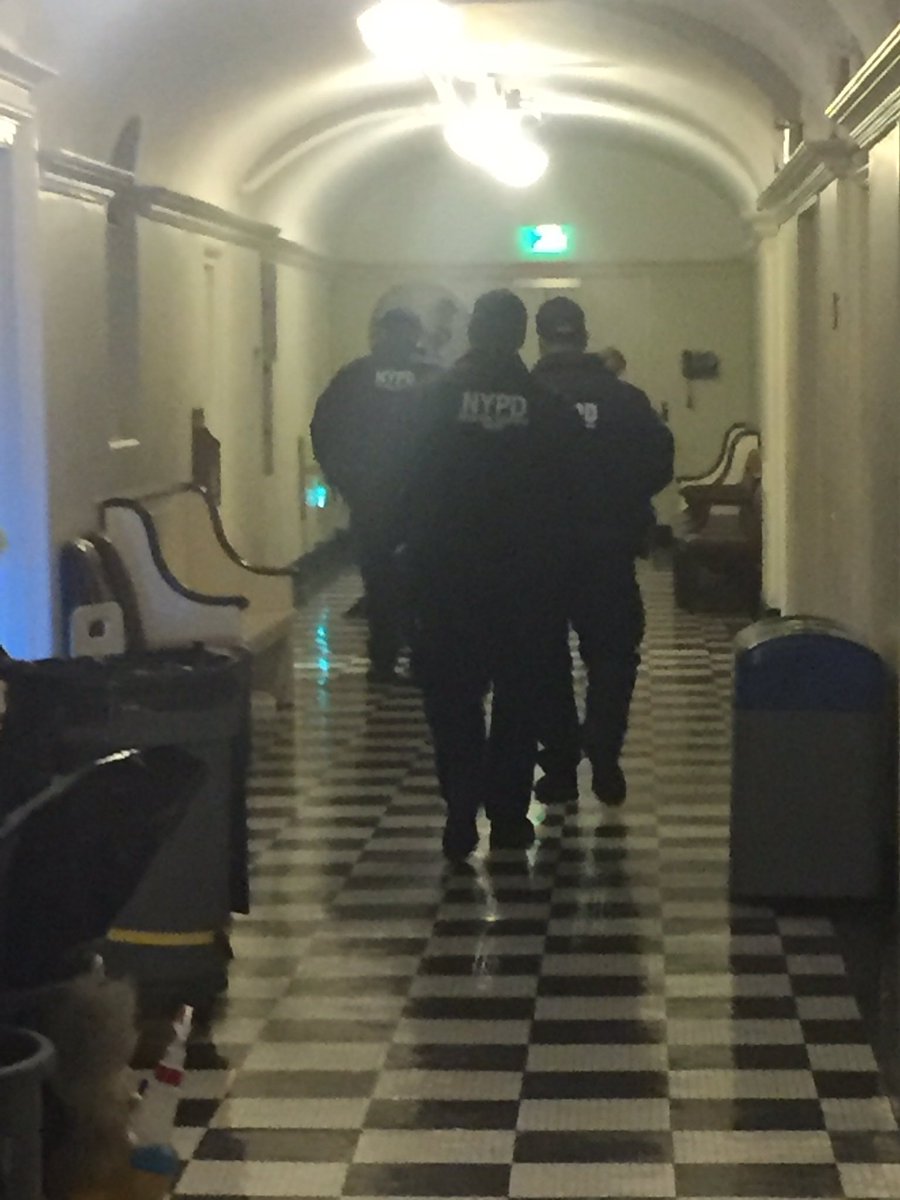 NYPD in #cityhall basement heading to <a href="/NYCCouncil/">New York City Council</a> meeting with lots of flex cuffs