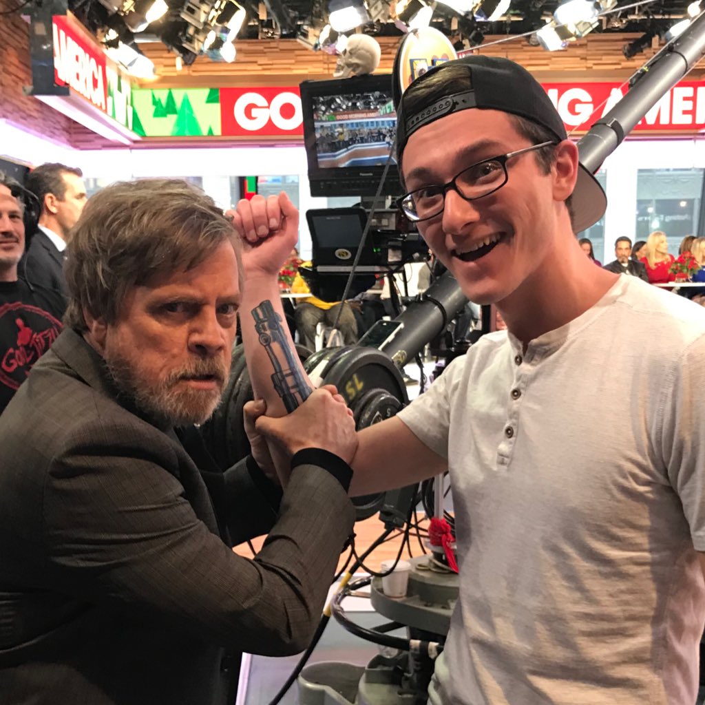 MarkHamill's tweet photo. What a devoted #StarWars fan! If @RobbieBarstool was actually committed enough to tattoo a lightsaber on his forearm-the least I could do was hoist it proudly (or have him actually committed) The entire @GMA audience was beyond wonderful-Thank you ALL! ❤️ https://t.co/VDfFrvQzH8