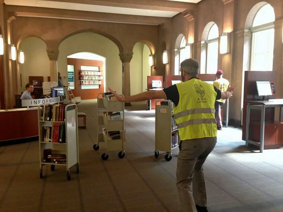 CUAlibraries's tweet photo. #TBT to that time the veloci-carts were acting up. #Prattkeeping #JurassicLibrary #CatholicU https://t.co/LLthI79dT6