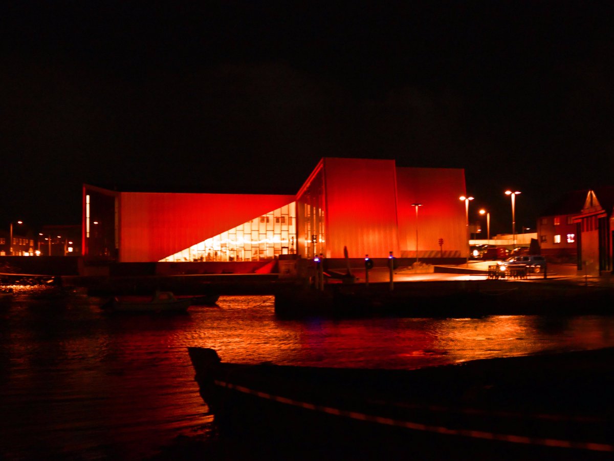 ShetlandLGBT's tweet photo. Lerwick just turned red for #WorldAidsDay #ClickiminBroch #LerwickTownHall #Mareel @ShetIslandsCll @MareelShetland #makeHIVhistory #ZeroHIVStigma #LetsEndIt #SeeRed #HIV #Shetland https://t.co/o02r1zizx4