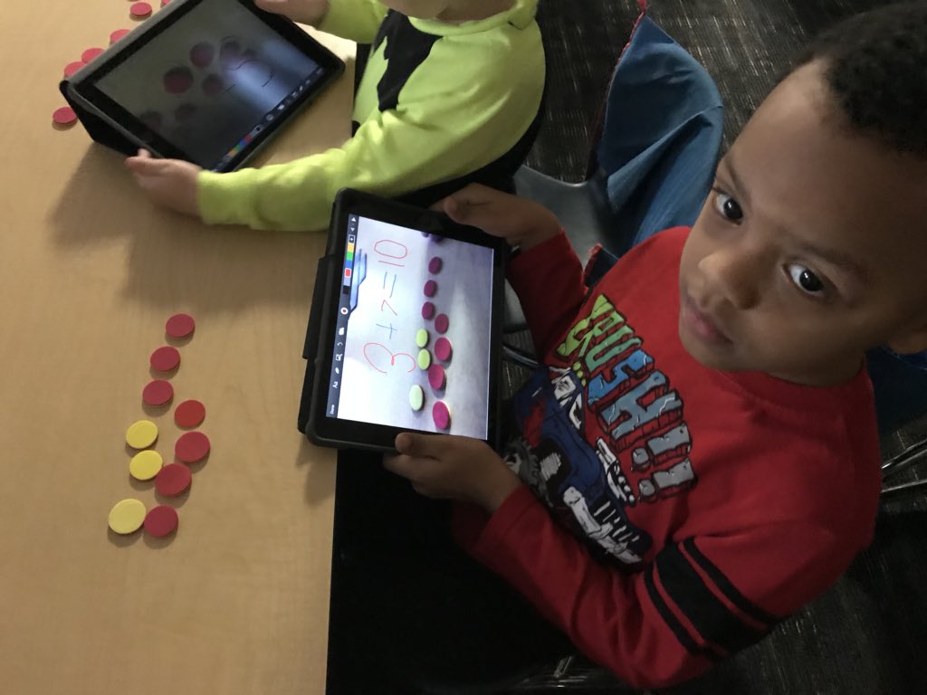 MrsLuceWNES's tweet photo. K’s creating, photographing, and writing number sentences after a week of practice adding to 10! #WNES https://t.co/sNzQFtr2Jt