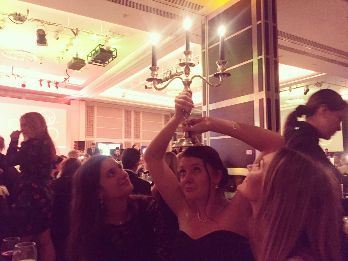 GemmaSharp's tweet photo. The lengths table 37 will go to, to win a bottle of magnum! #ScreenAwards @Organic_Film https://t.co/eweeOHQkCI