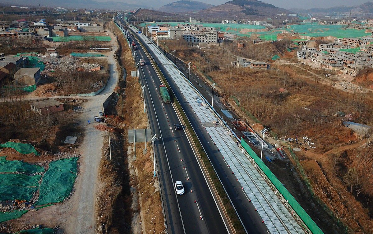 PDChina's tweet photo. World’s first #photovoltaic highway to open in E #China, able to charge moving electric vehicles by collecting solar power https://t.co/Y1rQ3jliMU