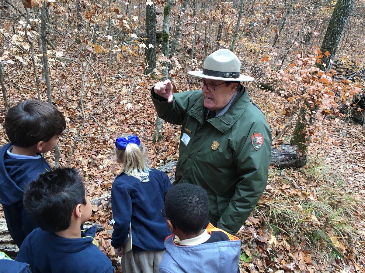 julabbie's tweet image. First grade explorers head boldly into Discovery Woods with Park Ranger Jerry Hightower #Trinitylearns