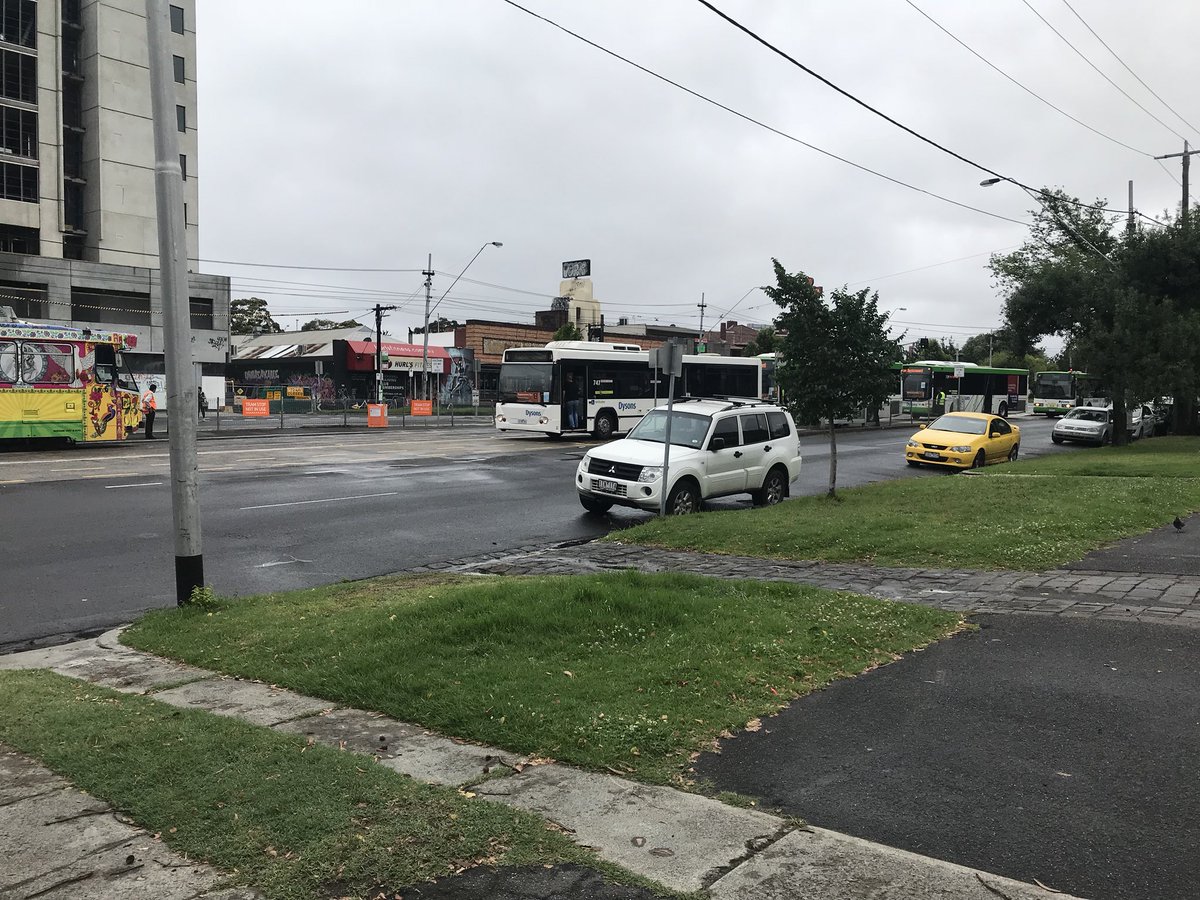 DocBrent's tweet photo. Its buses everywhere in Queens Parade. #trainlinesdown #NthFitzroy #TheBigWet https://t.co/BLIQ1Z3Ows