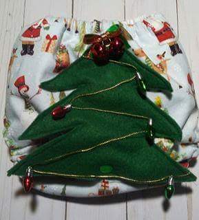 LilBeanDiapers's tweet photo. ⭐NEW ITEM⭐
🎄🎄🎄 
"Christmas Tree" pocket diaper. The Christmas tree attaches and detaches from the diaper!!!
#lilbeandiapers #clothdiaper #baby #diapers #Christmas  #Holidays  #Christmastree 
🎄🎄🎄🎄
For more info &amp; pricing: https://t.co/5JFqNF8h7g https://t.co/OfEiW1RMjU https://t.co/hSTFq4jY8k