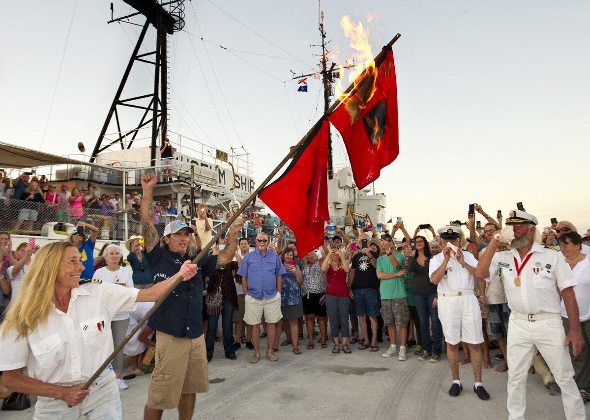 nbc6's tweet image. VIDEO: To celebrate the end of the hurricane season, some Florida Keys residents burned hurricane warning signs on.nbc6.com/kolw1eP