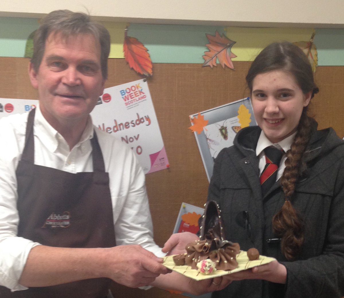 DumGalLibraries's tweet image. Choc-tastic time @BookWeekScot Chocolate Event in #Lockerbie Library. Readings, suberb chocolate demonstration from Dennis of @AbbottsChocs &amp;amp; handmade chocolates to take home - delicious!!. Congratulations to Lucy who won the Chocolate Decorated Shoe!!