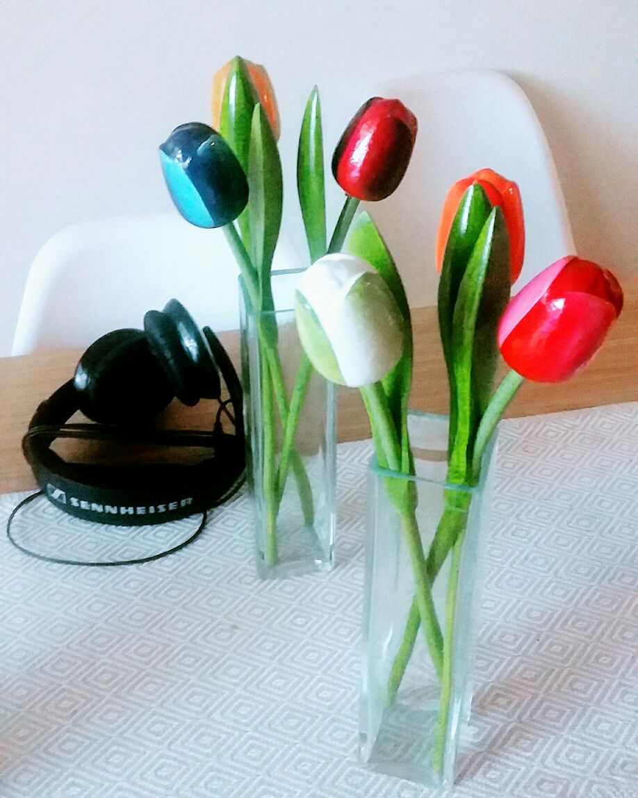 Murmur_Ireland's tweet photo. Wooden tulips, Sennheiser earphones and white Eiffel Chairs. #StillLife https://t.co/L6mBTVeQlc